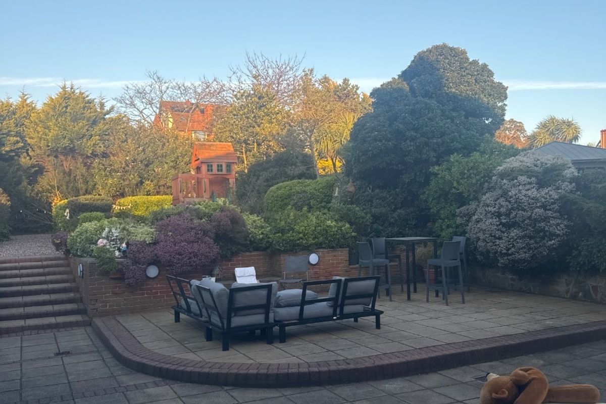 Before photo of a UK garden used to create an AI renovation mockup in TailoredQuote
