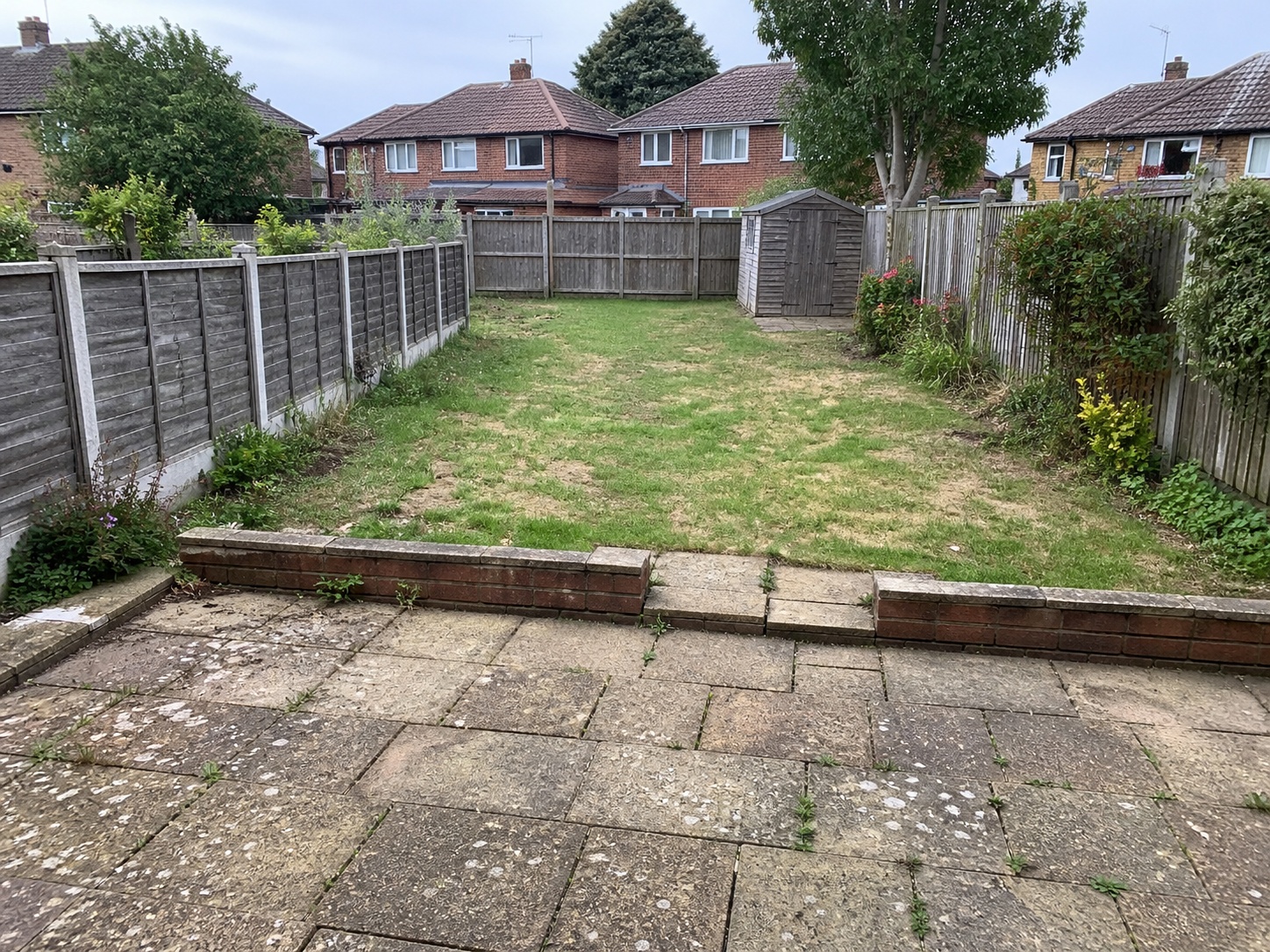 Concrete slab driveway before replacement, used as a before image in an AI mock-up
