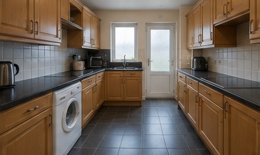 Before image showing a narrow dated galley kitchen for a TailoredQuote AI kitchen design mock-up.