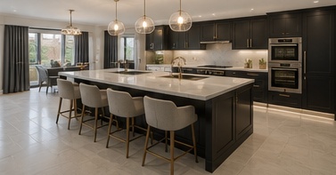 After image showing a premium black open-plan kitchen with island for a TailoredQuote visual quote.