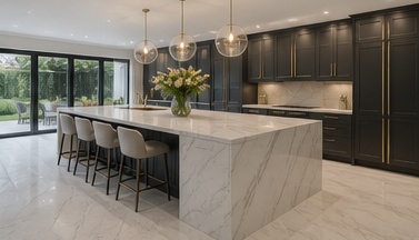 After image showing an ultra high-end charcoal and marble kitchen with oversized island for a TailoredQuote visual quote