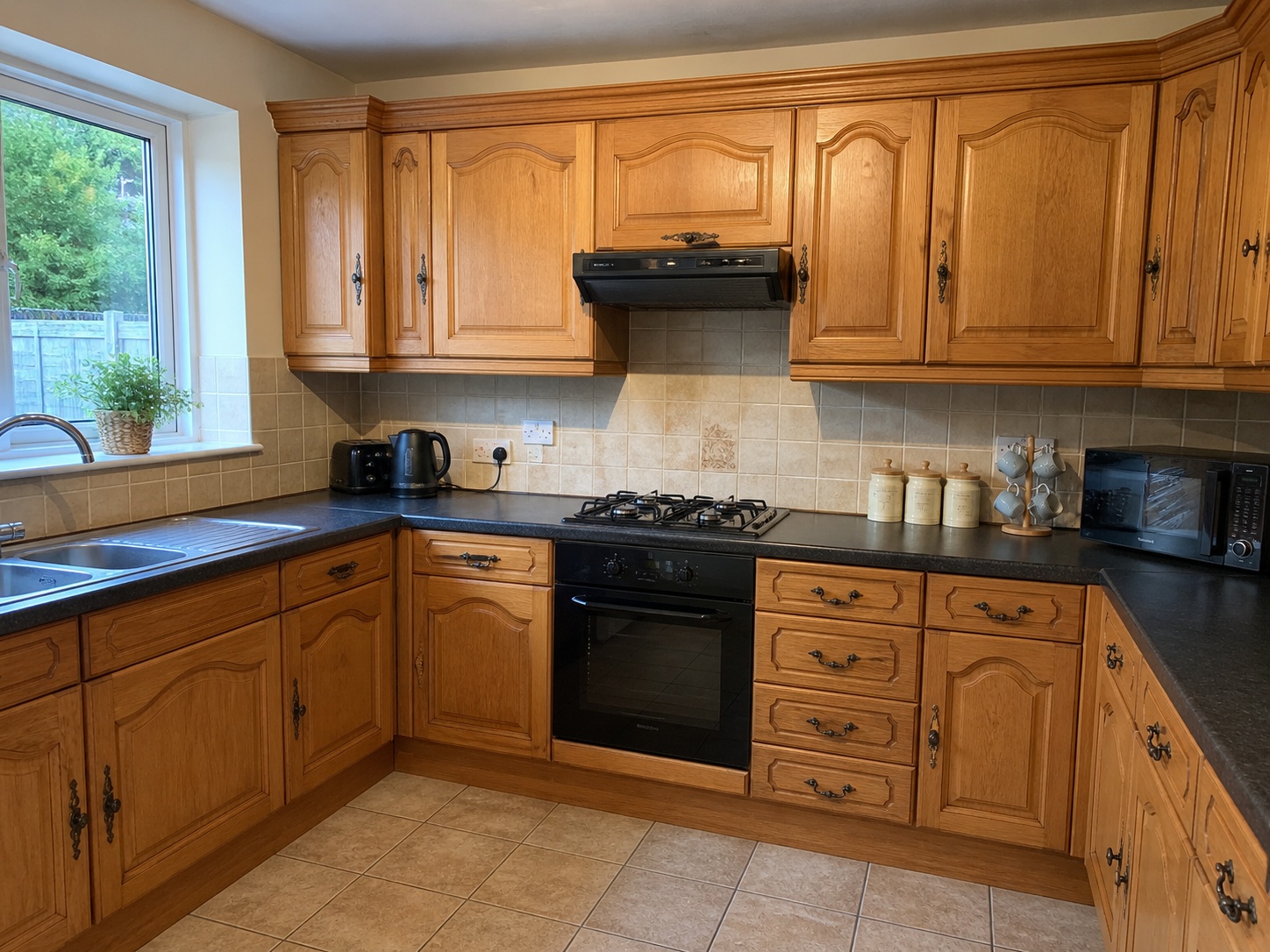 Example AI visual quote — older oak kitchen before respray, used as a before-and-after sales mock-up in TailoredQuote